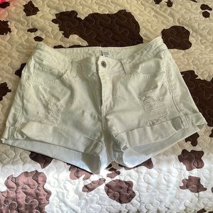 White jean shorts (sort of low waisted)